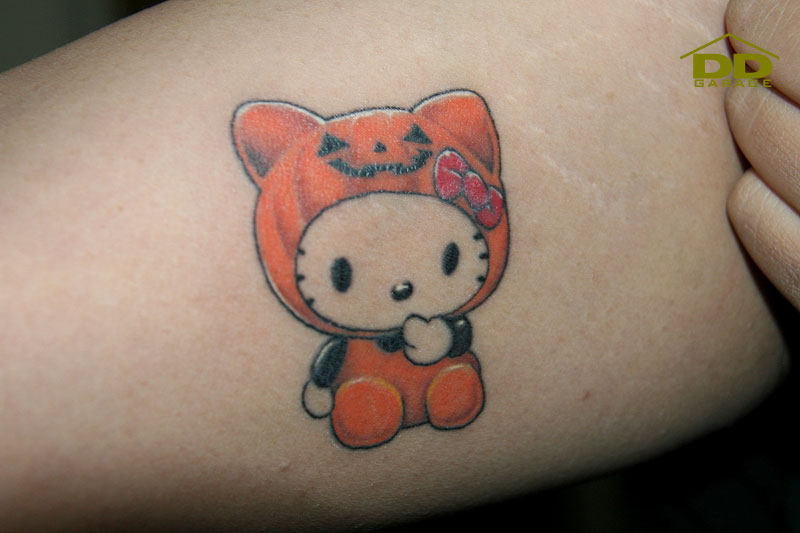 hello kitty tattoos designs. Mr. R got a Hello Kitty tattoo